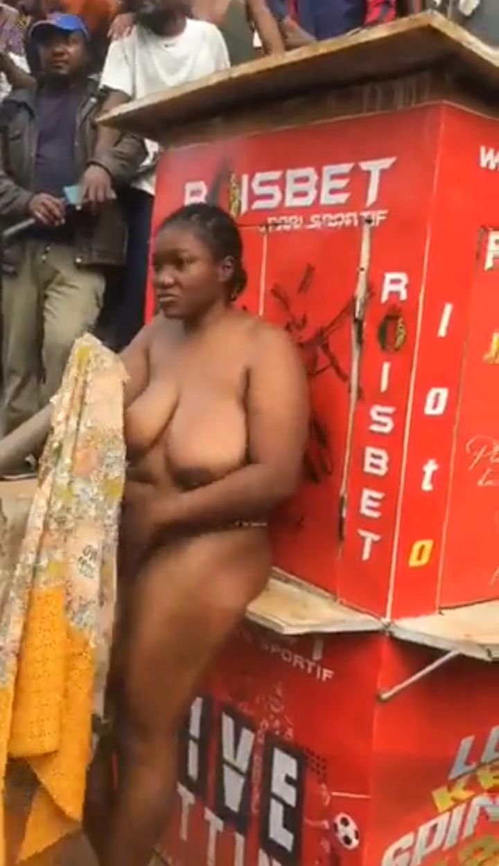 Woman With Big Breasts Stripped Naked In Public For Stealing In Cameroon 